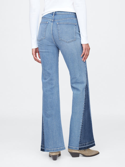 High Rise Patched '70er Schlagjeans