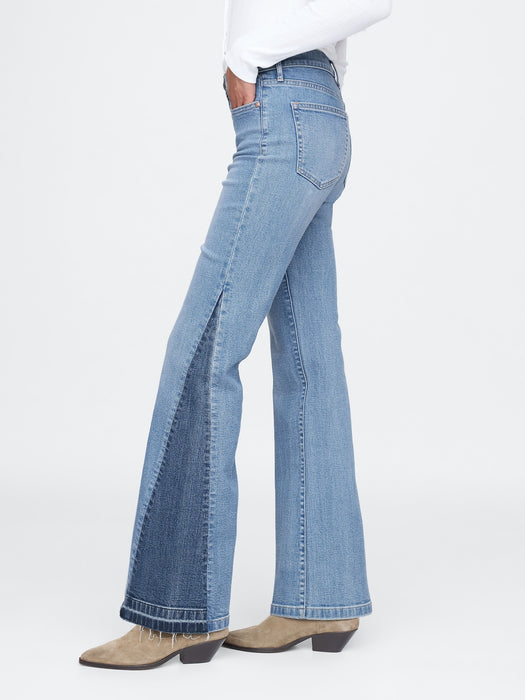 High Rise Patched '70er Schlagjeans